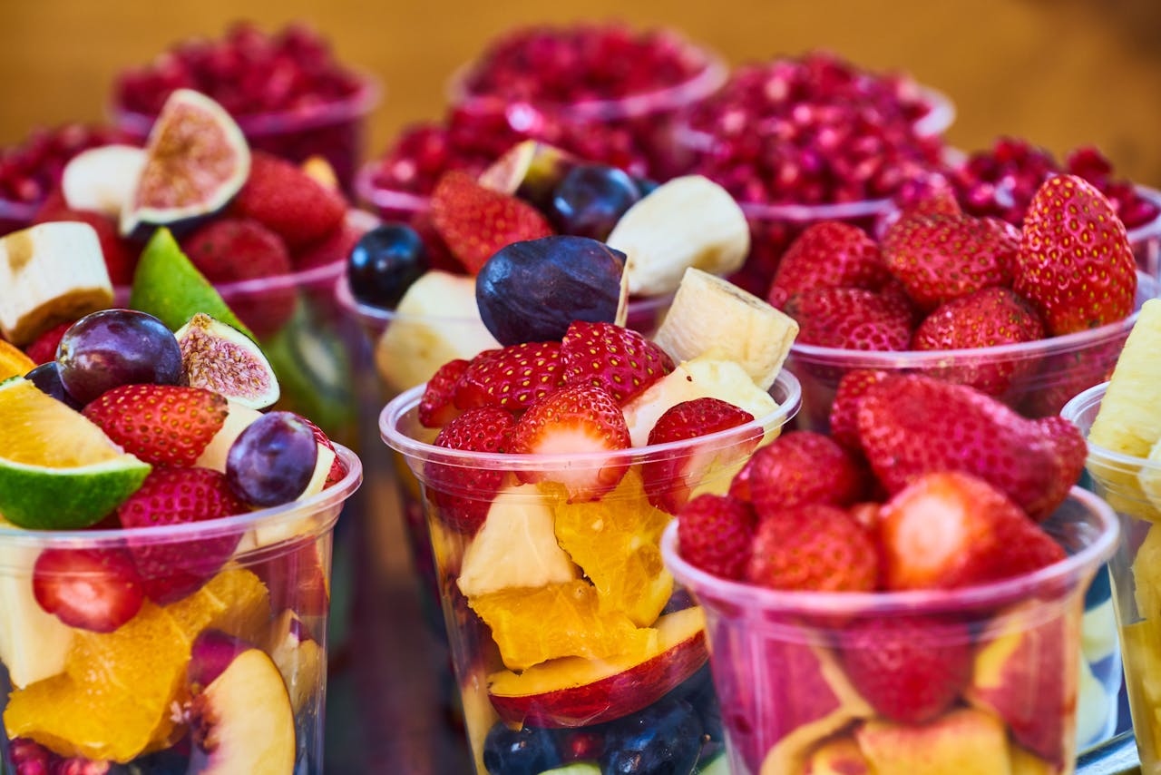 services-03 Vibrant and fresh fruit salad cups filled with assorted fruits, perfect for healthy eating.